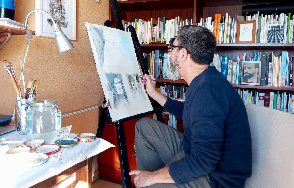 Imagen del escritor José Manuel Benítez Ariza pintando